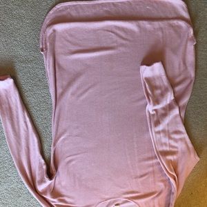 Pink beautiful sweater. Too small or I would keep